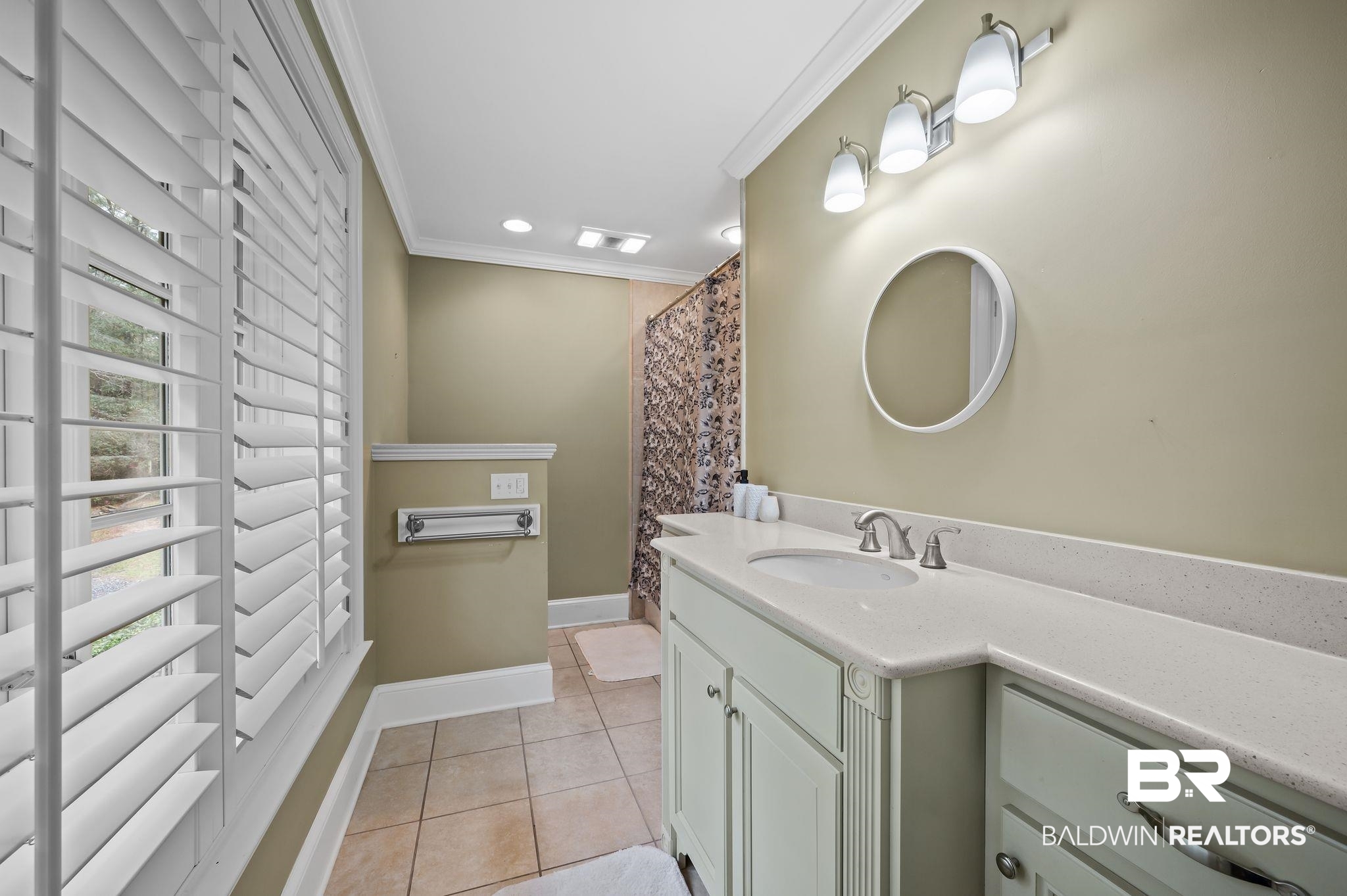 7850 Yorkhaven Road Mobile, AL 36695 - Photo 33 of 57 Full bathroom with visible vents, crown molding, baseboards, tile patterned floors, and vanity