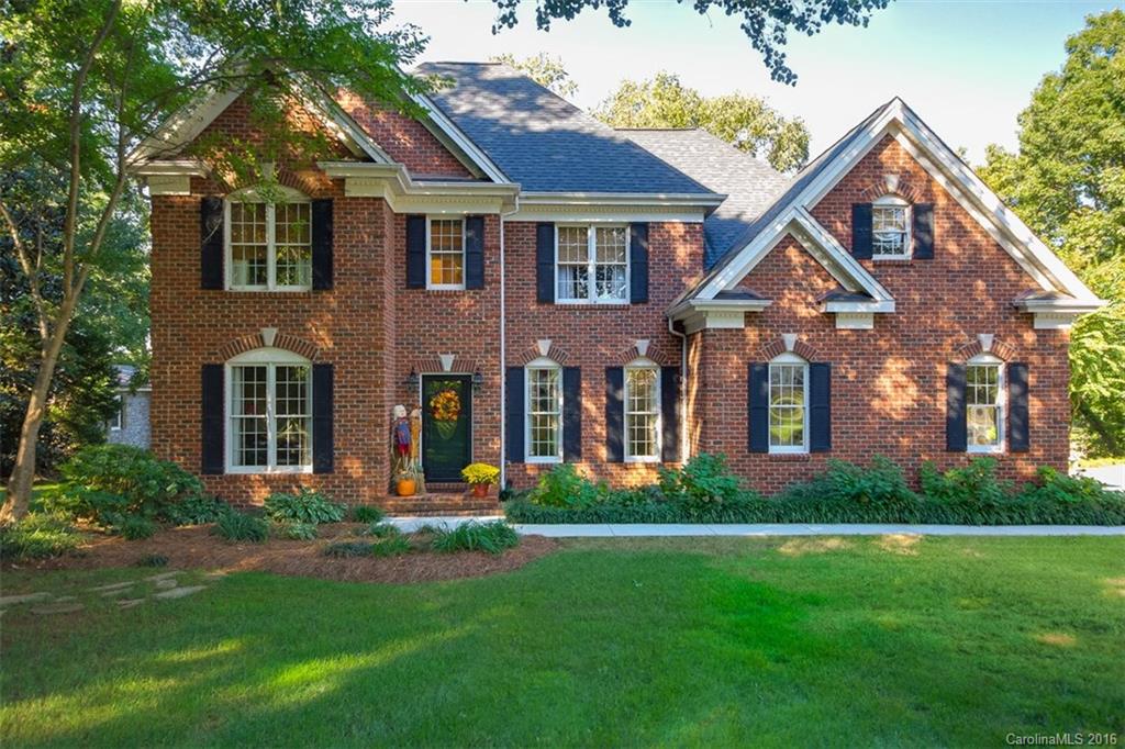 4567 Kiser Island Road Terrell, NC 28682 - Photo 1 of 24 a front view of a house with a yard and potted plants