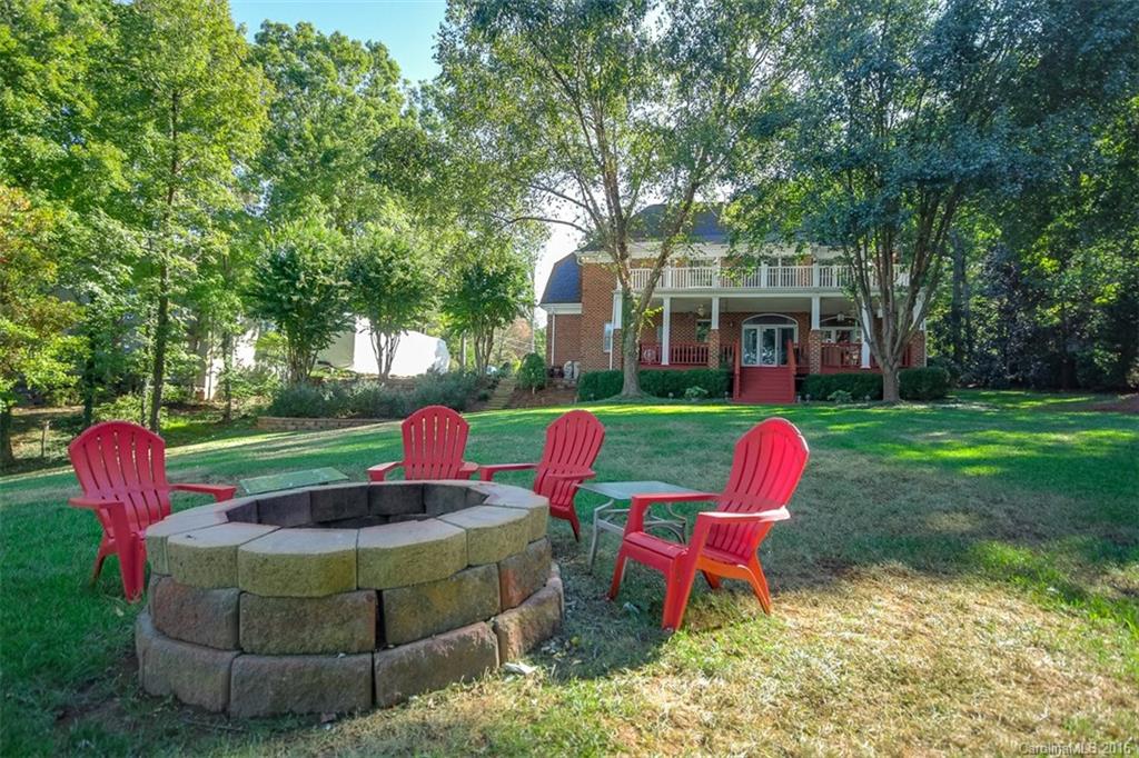 4567 Kiser Island Road Terrell, NC 28682 - Photo 22 of 24 a view of a chair and table in the garden