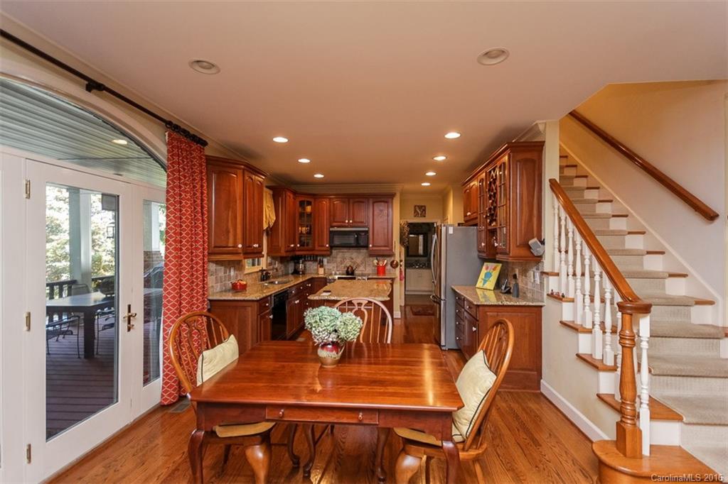 4567 Kiser Island Road Terrell, NC 28682 - Photo 8 of 24 a view of a dining room with furniture window and wooden floor