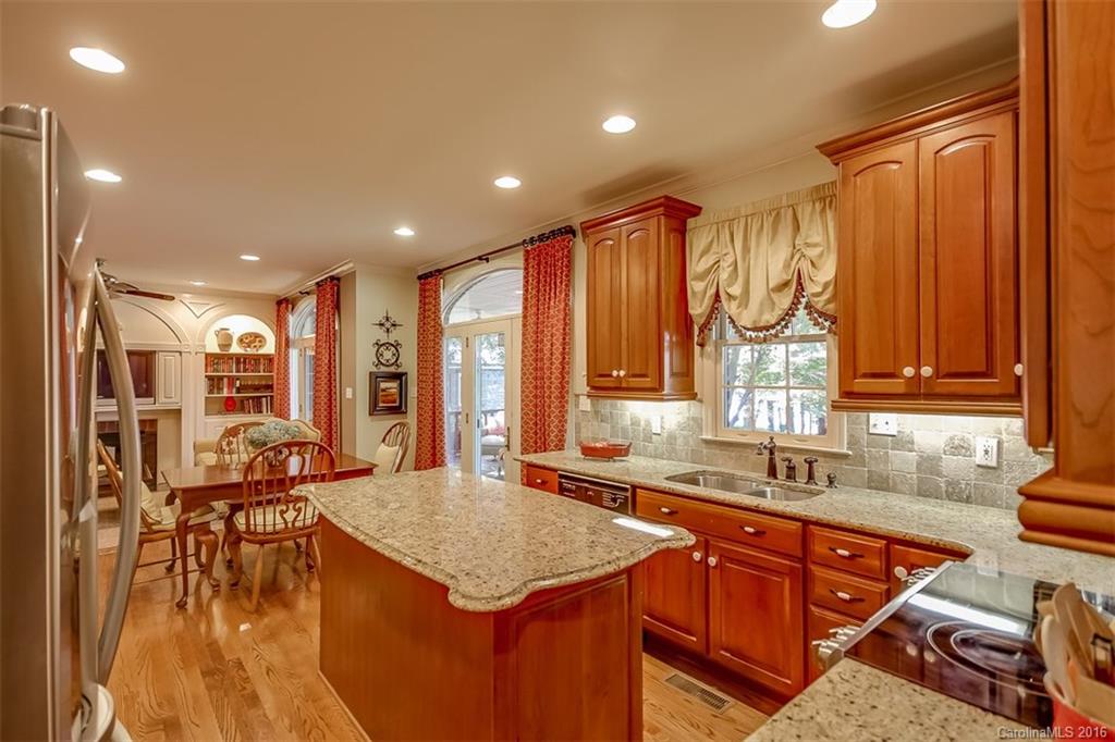 4567 Kiser Island Road Terrell, NC 28682 - Photo 10 of 24 a kitchen with stainless steel appliances granite countertop a sink and cabinets