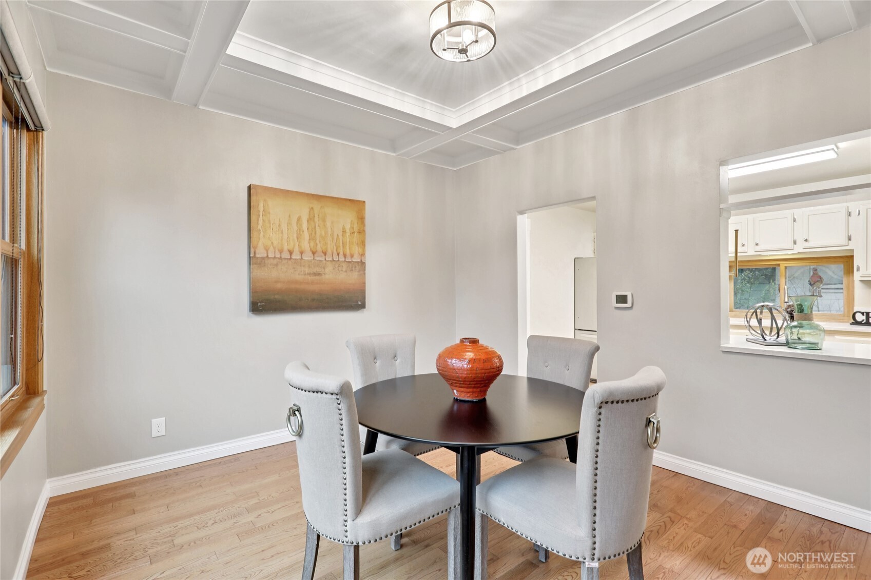 8207 Meridian Avenue North Seattle, WA 98103 - Photo 11 of 34 a view of a dining room with a table and chairs