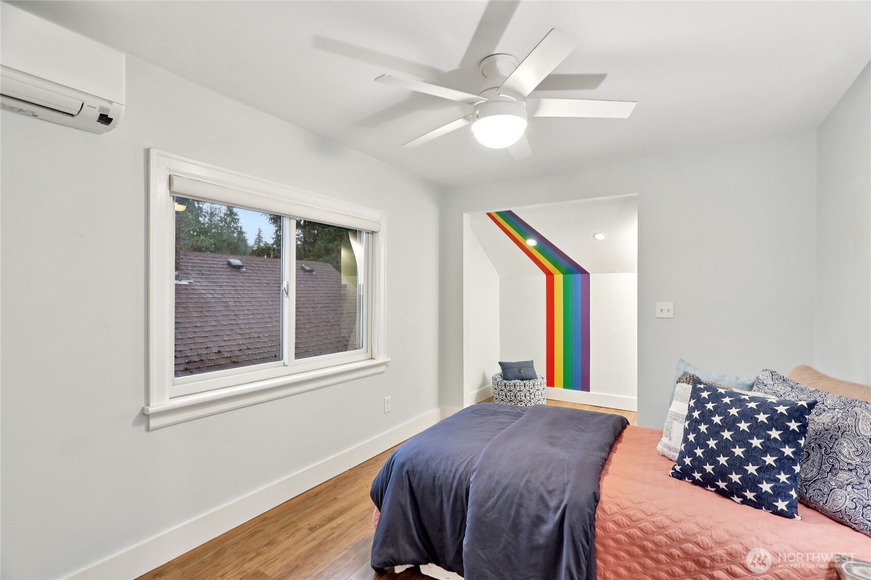 8207 Meridian Avenue North Seattle, WA 98103 - Photo 19 of 34 a bedroom with a bed and a window