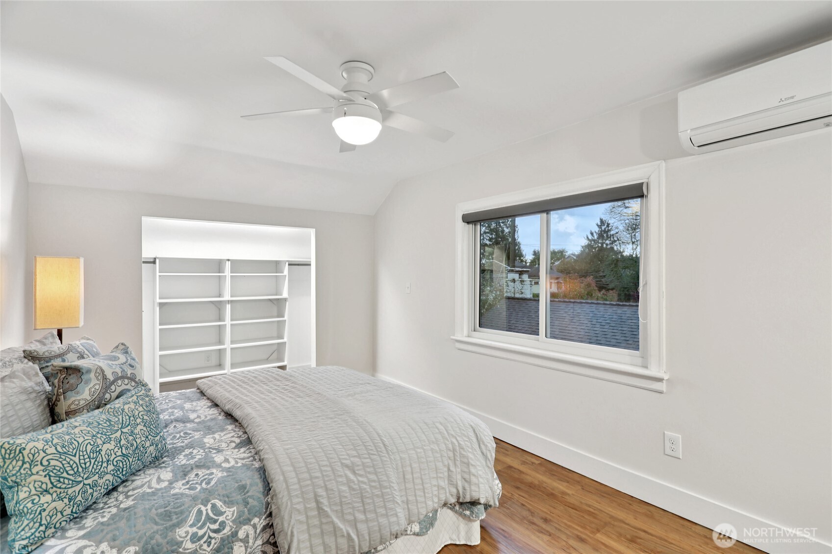 8207 Meridian Avenue North Seattle, WA 98103 - Photo 21 of 34 a bedroom with a bed and a window