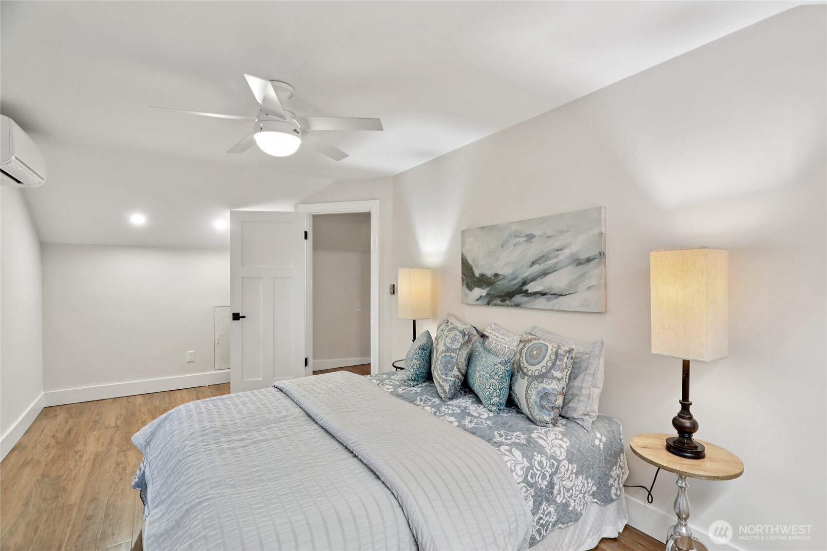 8207 Meridian Avenue North Seattle, WA 98103 - Photo 22 of 34 a bedroom with a bed and a lamp