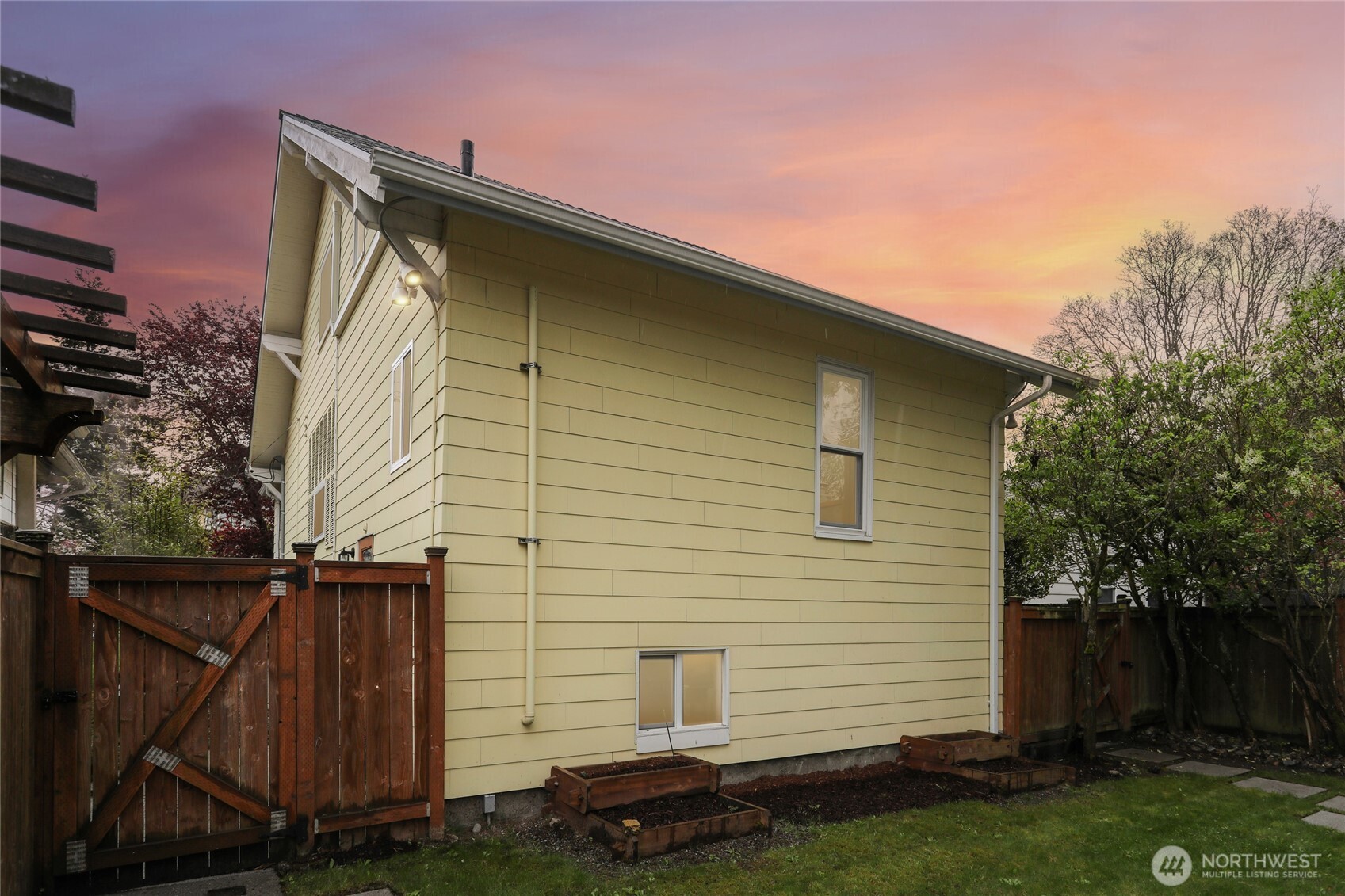 8207 Meridian Avenue North Seattle, WA 98103 - Photo 34 of 34 a front view of a house with a yard