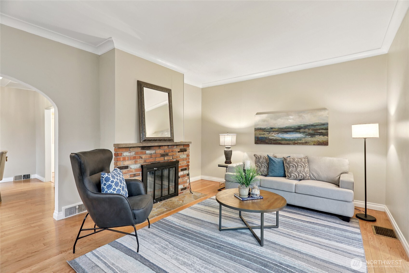 8207 Meridian Avenue North Seattle, WA 98103 - Photo 5 of 34 a living room with furniture and a wooden floor