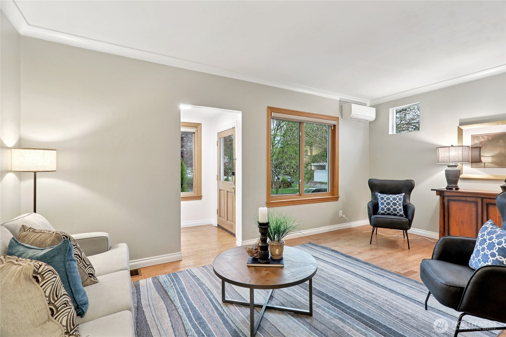 8207 Meridian Avenue North Seattle, WA 98103 - Photo 9 of 34 a living room with furniture and a potted plant