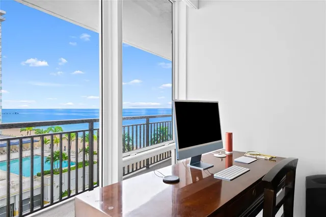 a bathroom with a bathtub shower sink and mirror