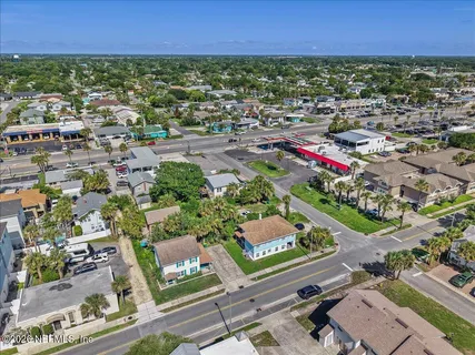 an aerial view of residential building and parking space