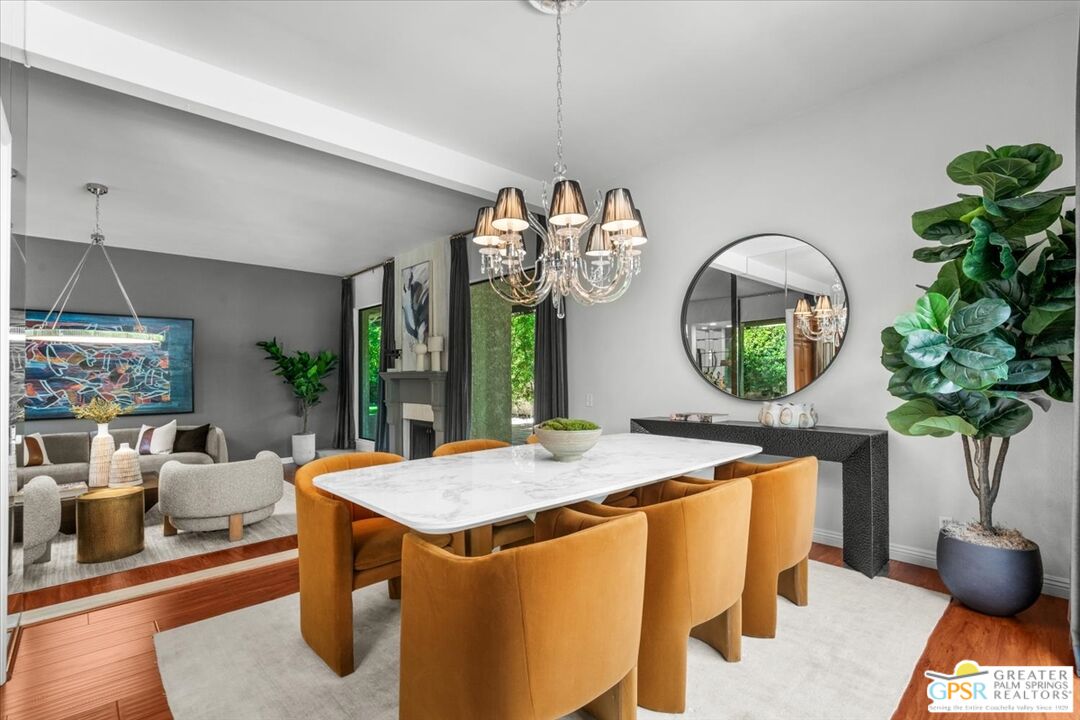 55 Sierra Madre Street Rancho Mirage, CA 92270 - Photo 11 of 59 a view of a dining room with a table and chairs