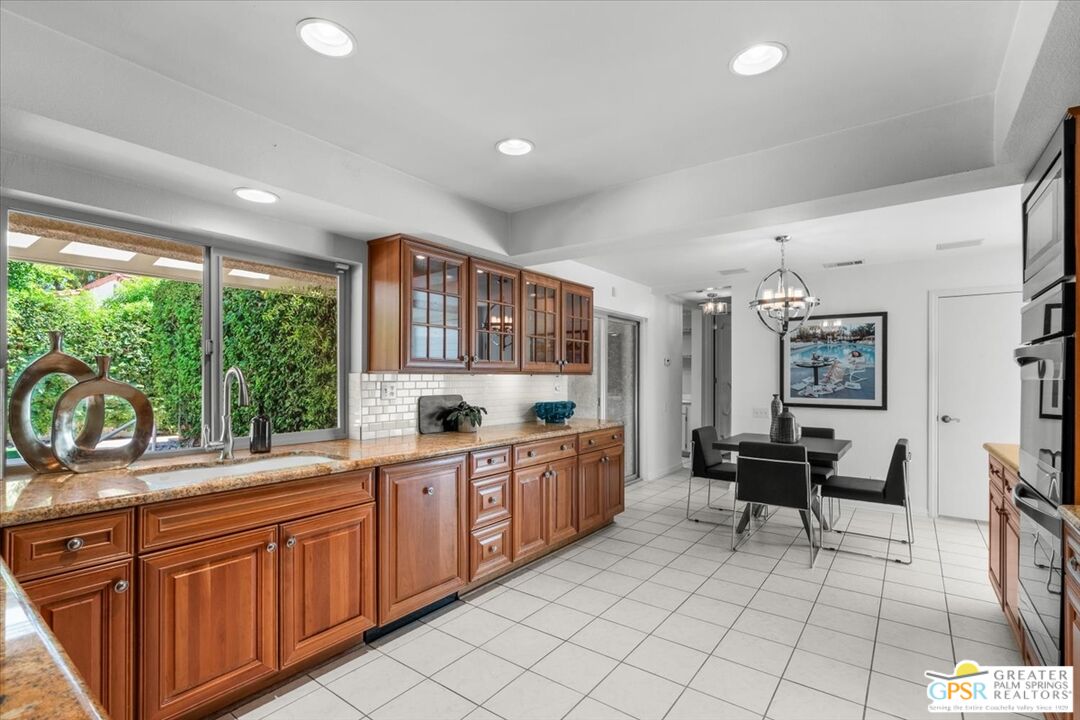 55 Sierra Madre Street Rancho Mirage, CA 92270 - Photo 13 of 59 a open kitchen with sink and cabinets
