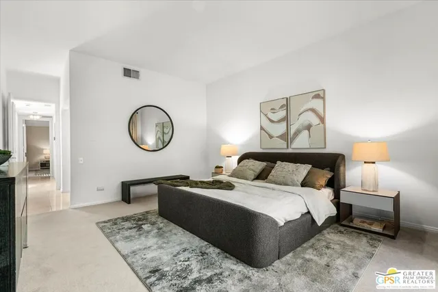 a spacious bathroom with a double vanity sink a large mirror and a bathtub next to a window