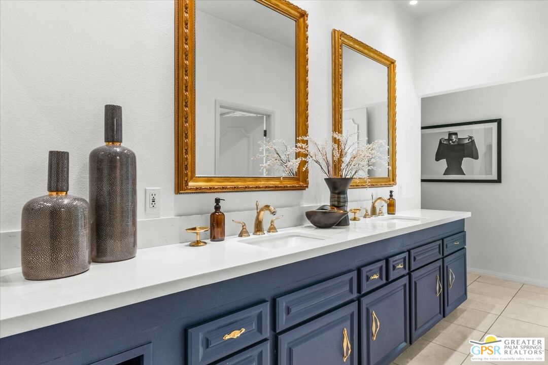 55 Sierra Madre Street Rancho Mirage, CA 92270 - Photo 22 of 59 a bathroom with a sink and a mirror