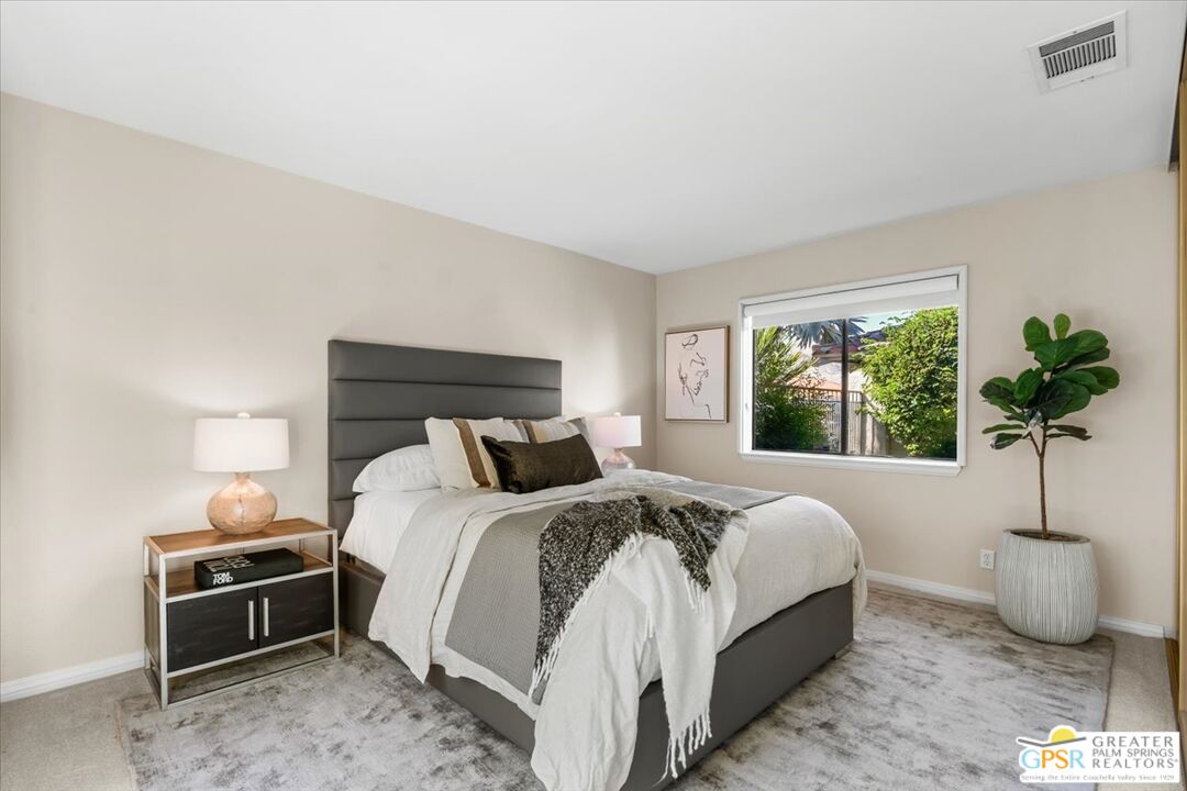 55 Sierra Madre Street Rancho Mirage, CA 92270 - Photo 25 of 59 a bedroom with bed and a window
