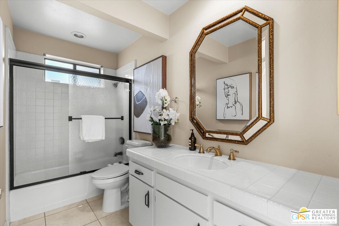 55 Sierra Madre Street Rancho Mirage, CA 92270 - Photo 29 of 59 a bathroom with a sink a toilet and shower