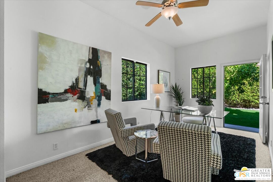 55 Sierra Madre Street Rancho Mirage, CA 92270 - Photo 33 of 59 a living room with furniture and a window
