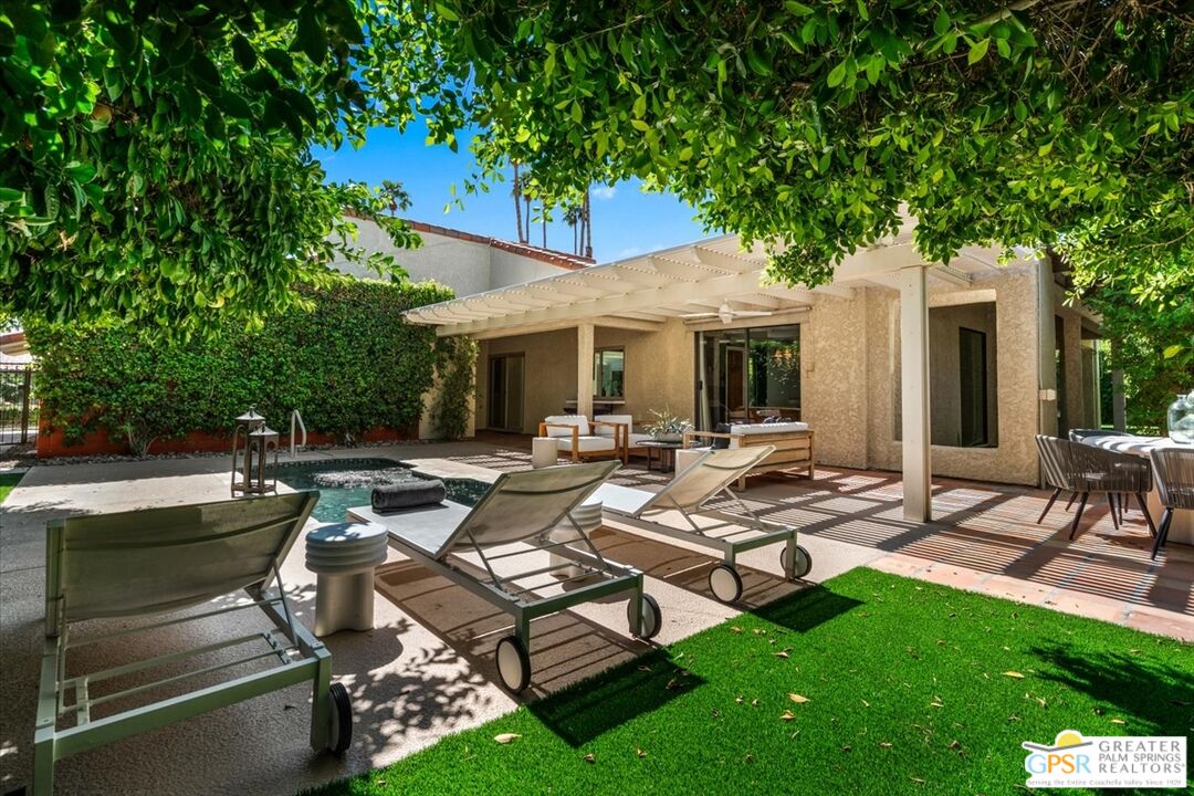 55 Sierra Madre Street Rancho Mirage, CA 92270 - Photo 36 of 59 a view of backyard of house with yard patio and outdoor seating