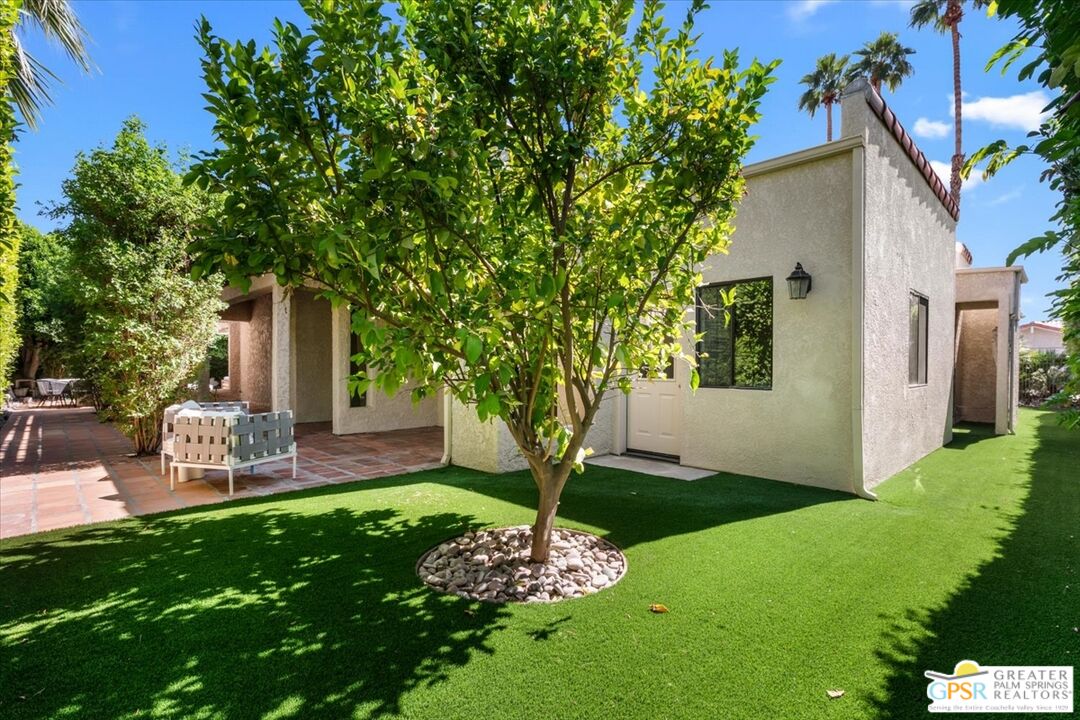 55 Sierra Madre Street Rancho Mirage, CA 92270 - Photo 46 of 59 a front view of a house with garden