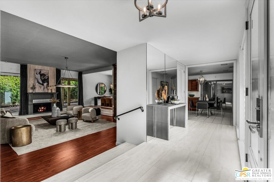 55 Sierra Madre Street Rancho Mirage, CA 92270 - Photo 5 of 59 a living room with furniture and a wooden floor