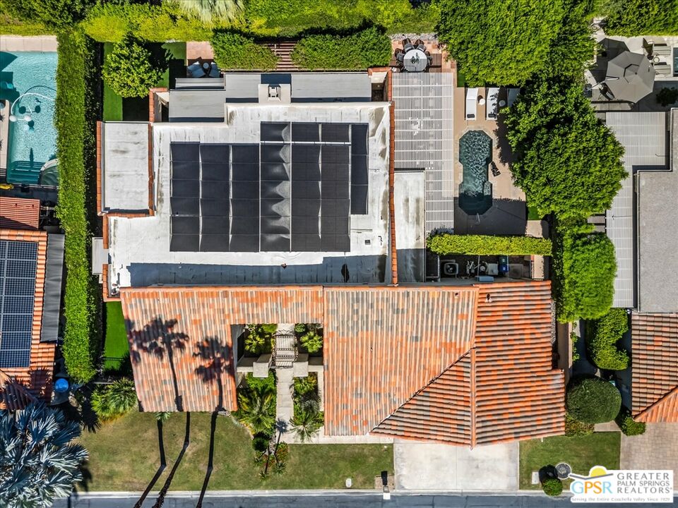 55 Sierra Madre Street Rancho Mirage, CA 92270 - Photo 58 of 59 a front view of a house with garden