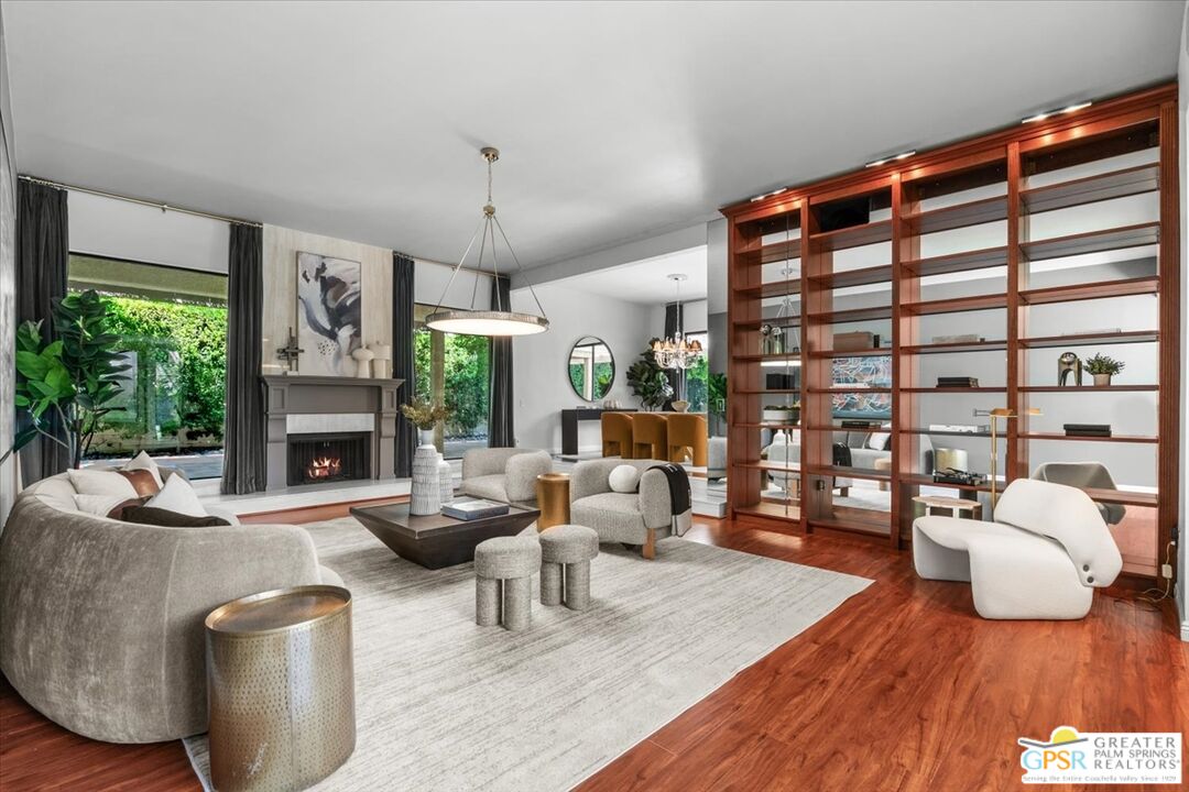 55 Sierra Madre Street Rancho Mirage, CA 92270 - Photo 7 of 59 a living room with furniture and a large window