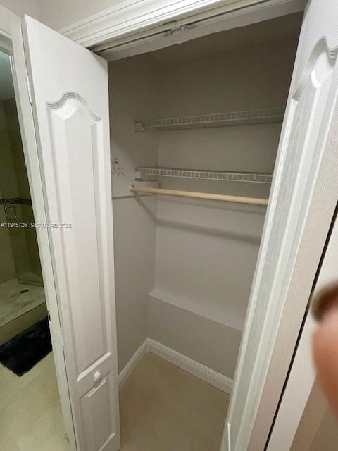 14983 Southwest 63rd Street Miami, FL 33193 - Photo 7 of 8 a bathroom with a washer and dryer