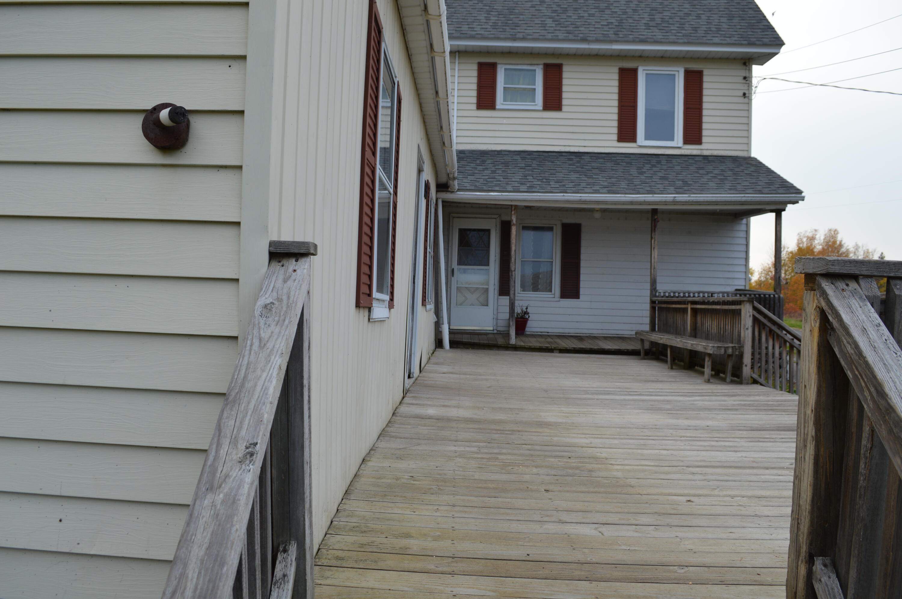153 Pelletier Road Fort Kent, ME 04743 - Photo 13 of 36 Deck and new roof
