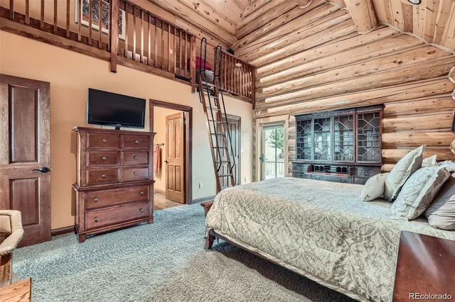 a living room with a couch and a table