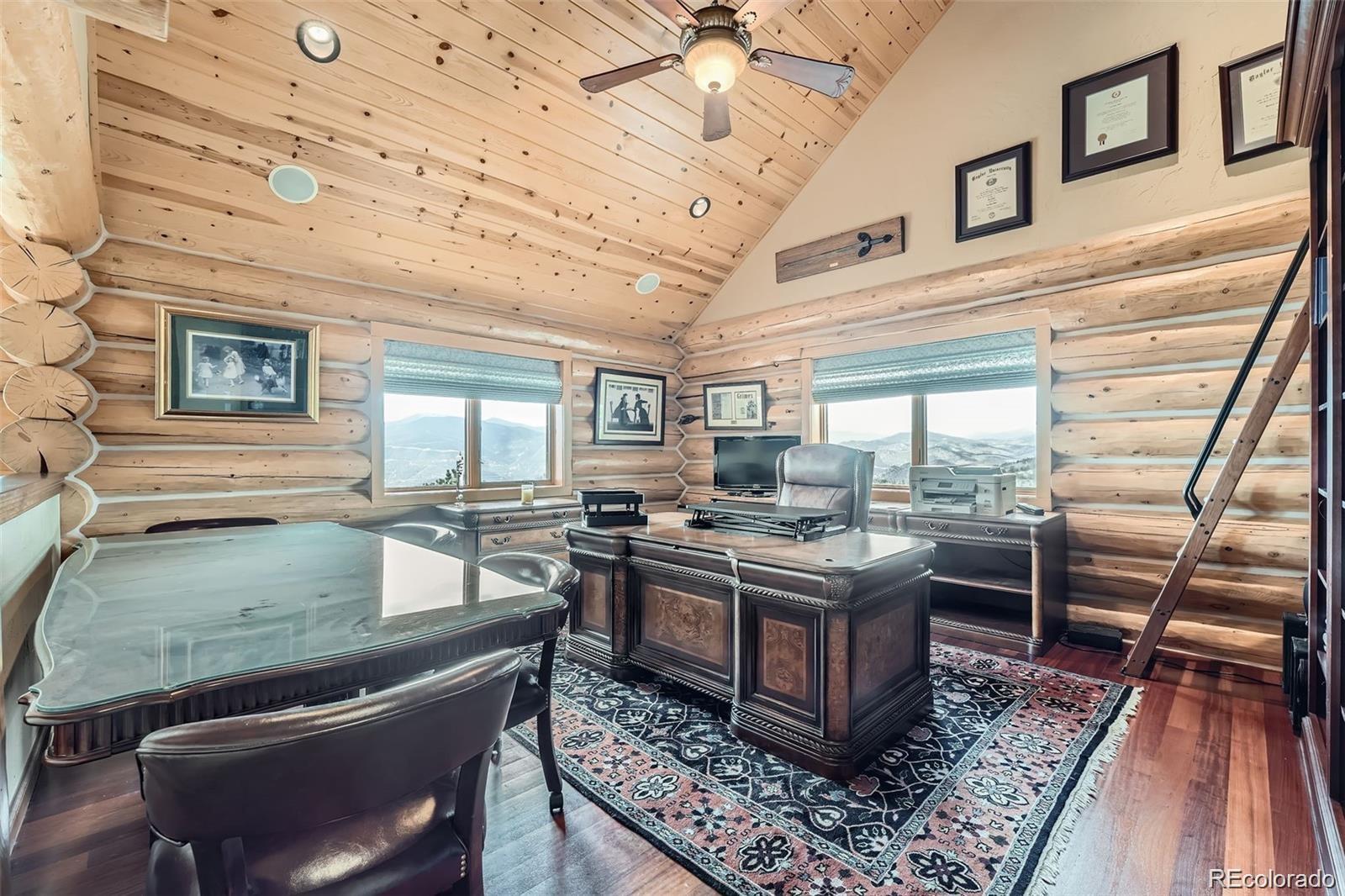 401 Raptor Point Golden, CO 80403 - Photo 21 of 40 a living room with a couch and a table
