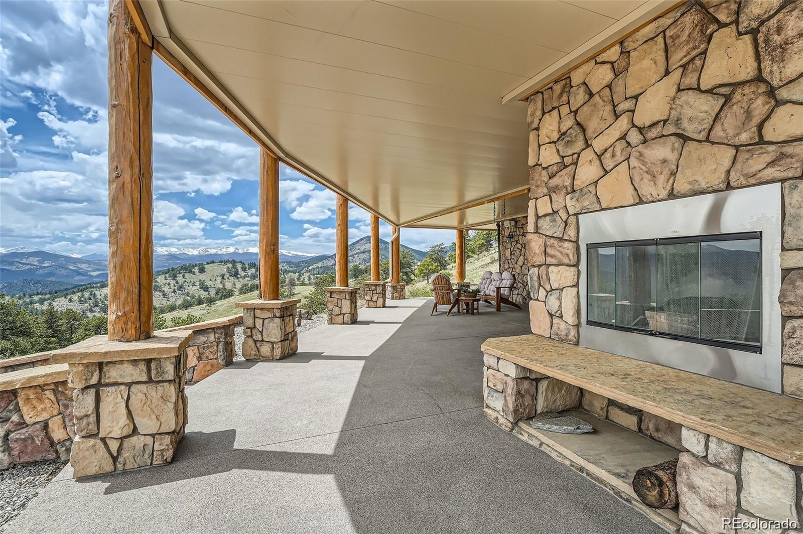 401 Raptor Point Golden, CO 80403 - Photo 23 of 40 a living room with furniture and a flat screen tv