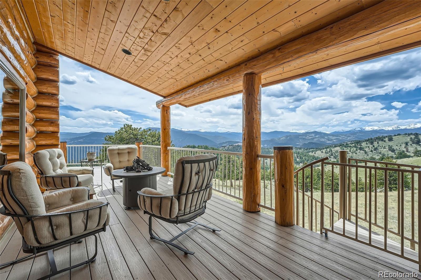 401 Raptor Point Golden, CO 80403 - Photo 37 of 40 a balcony with furniture and wooden floor