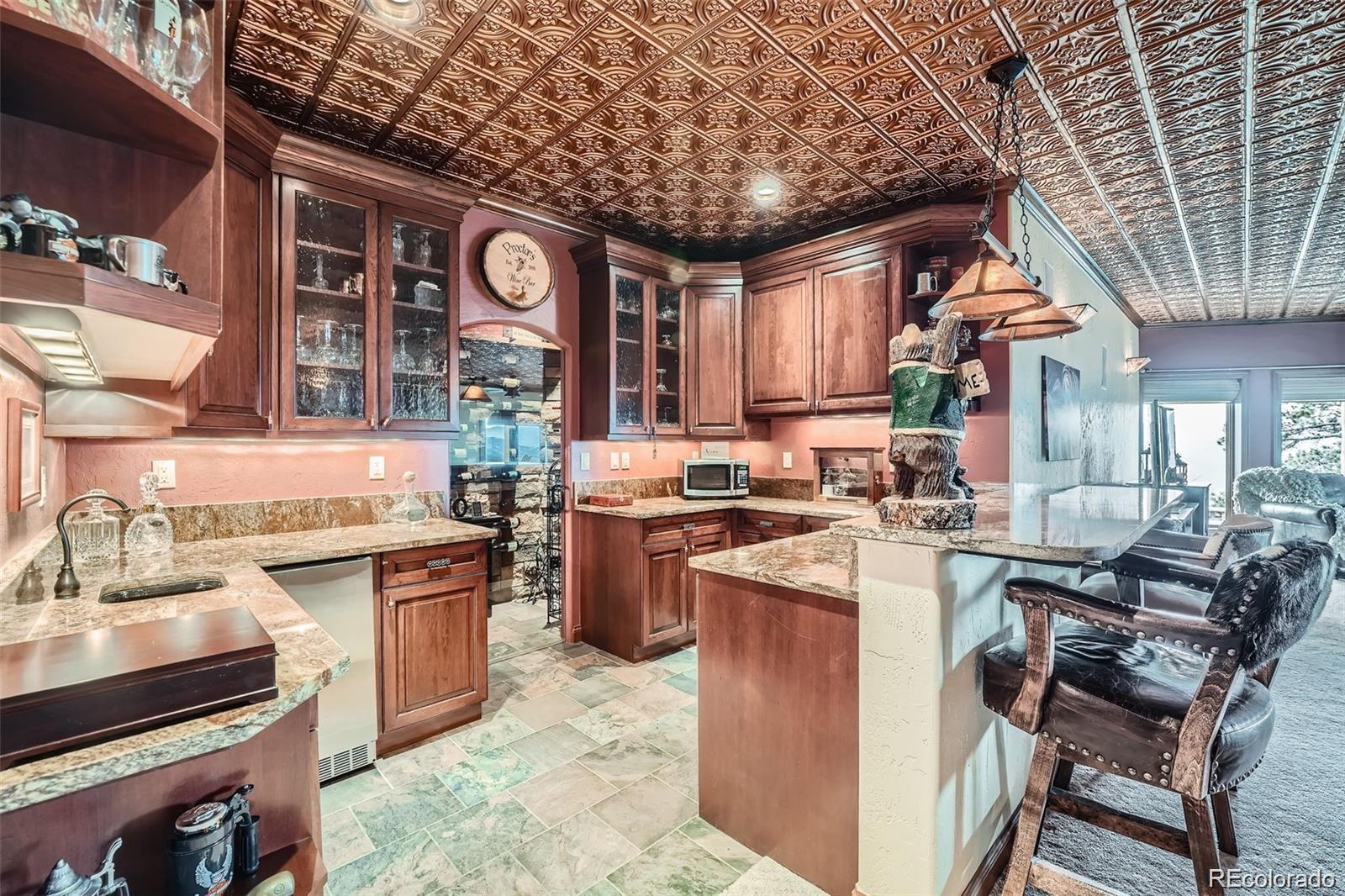401 Raptor Point Golden, CO 80403 - Photo 5 of 40 a kitchen with lots of counter top space