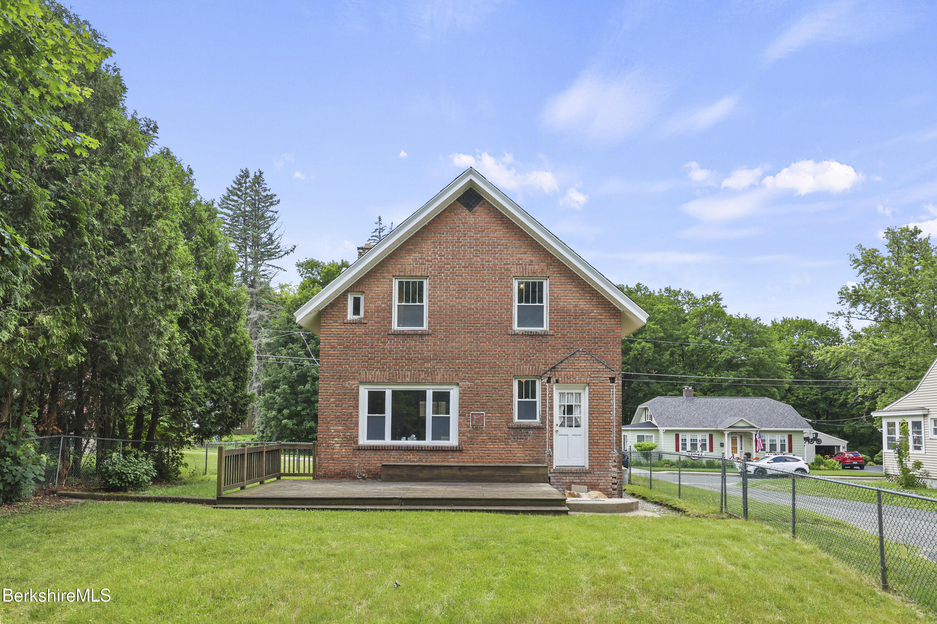 84 Notch Road North Adams, MA 01247 - Photo 25 of 30 a front view of houses with yard and green space