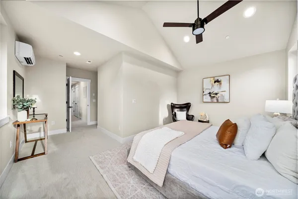 a bedroom with a bed and furniture