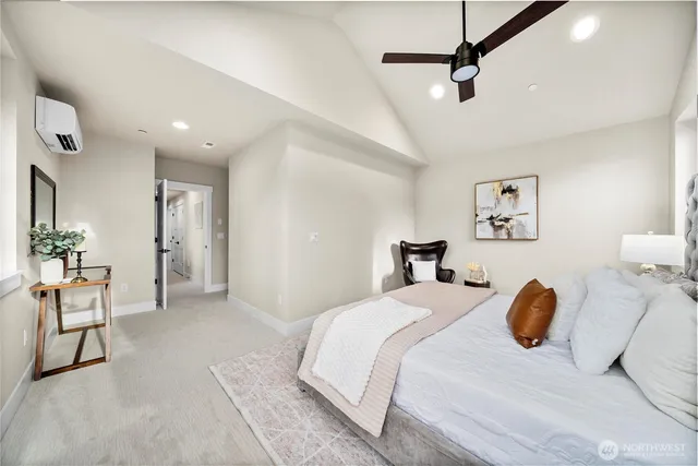 a bedroom with a bed and furniture