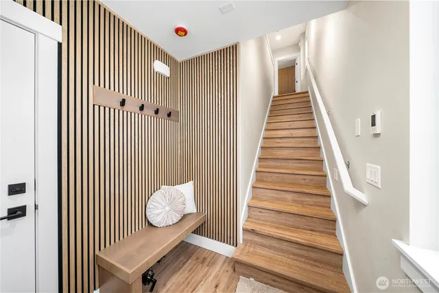 a view of entryway with wooden floor