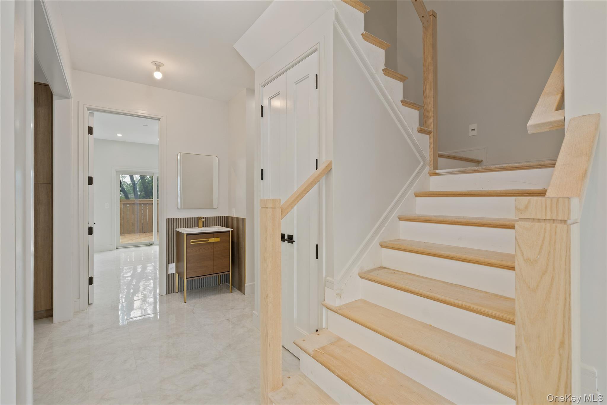 15 Ridge Avenue, Unit 101 Spring Valley, NY 10977 - Photo 29 of 41 a view of entryway with white walls and stairs