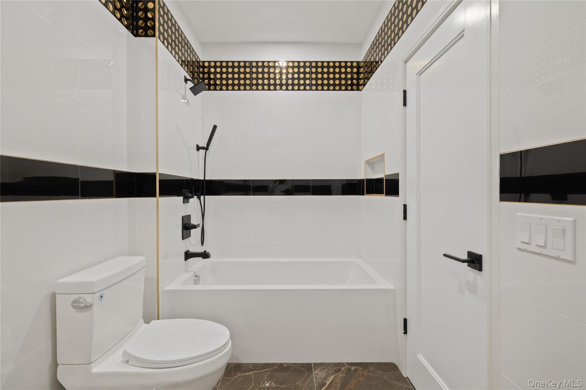 15 Ridge Avenue, Unit 101 Spring Valley, NY 10977 - Photo 35 of 41 a bathroom with a toilet a sink and bathtub