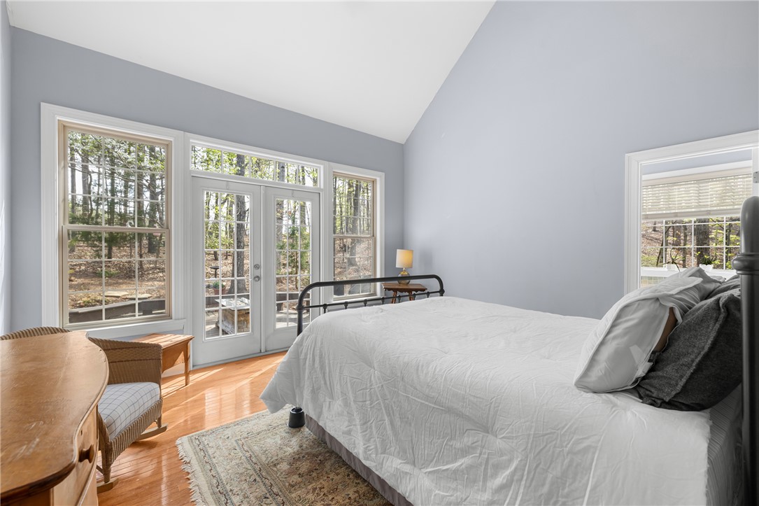 3 Halyard Way Salem, SC 29676 - Photo 16 of 48 This spacious room features vaulted ceilings, rich hardwood floors, and French doors that open to nature.