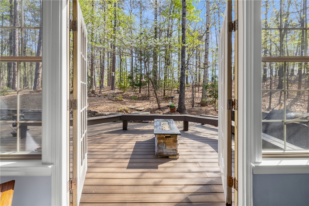 3 Halyard Way Salem, SC 29676 - Photo 20 of 48 Step out to a private wooded deck with built-in seating and a fire pit.