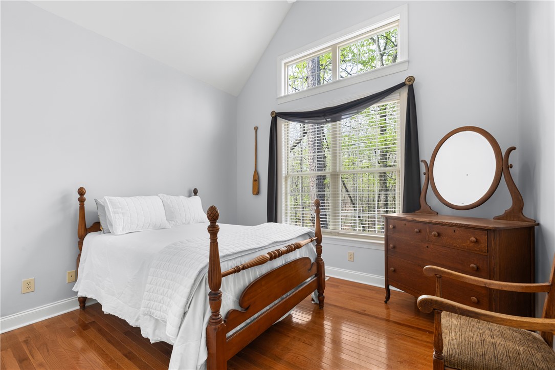 3 Halyard Way Salem, SC 29676 - Photo 26 of 48 This serene bedroom offers rich hardwood floors, vaulted ceilings, and ample natural light.