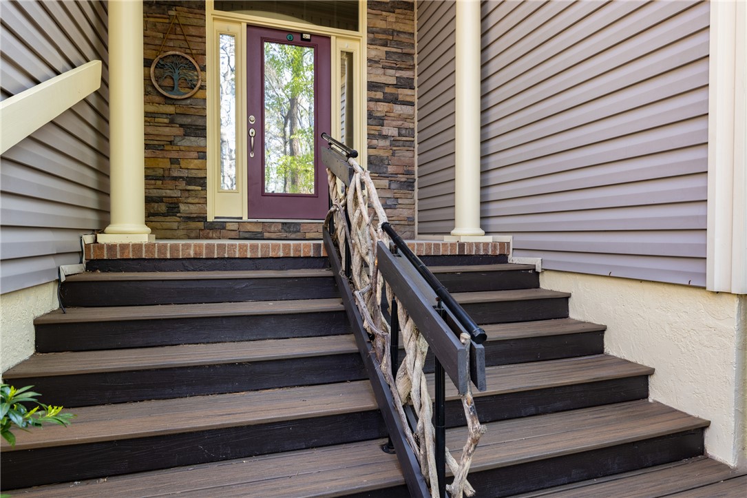 3 Halyard Way Salem, SC 29676 - Photo 30 of 48 Enter this home through a charming porch featuring a unique banister and stone facade.