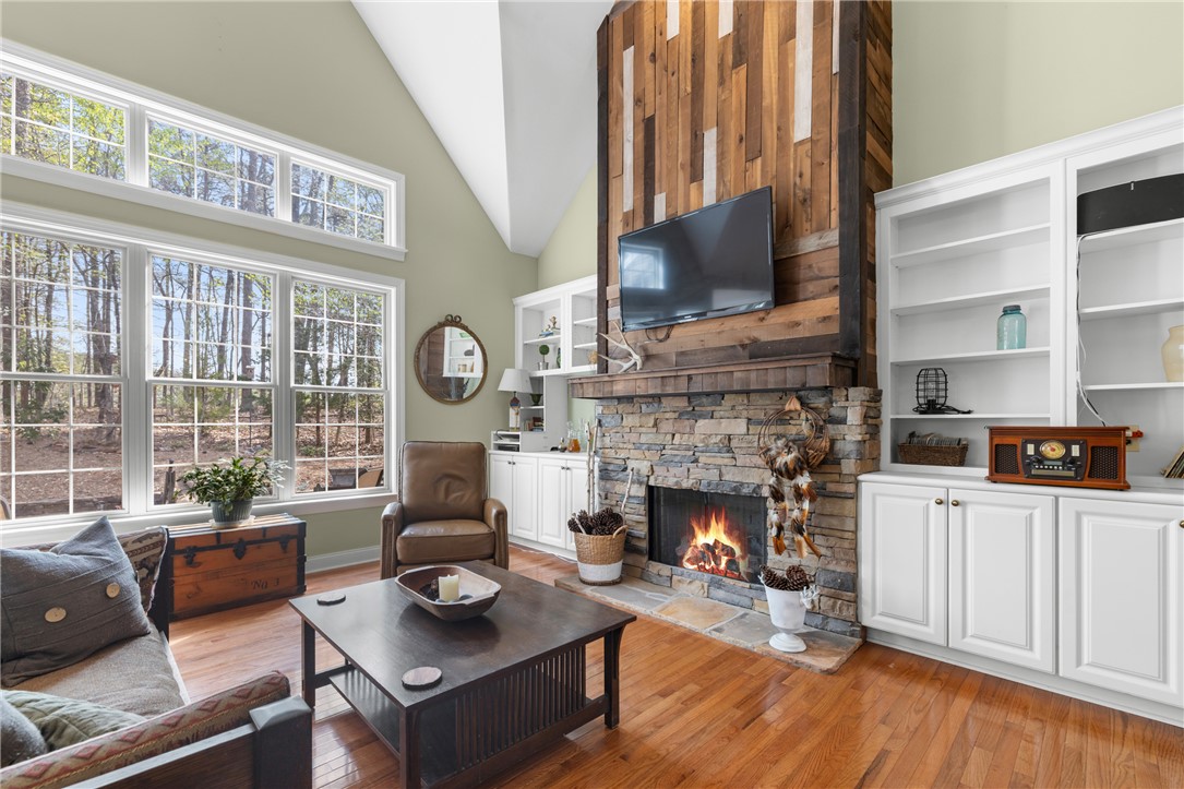 3 Halyard Way Salem, SC 29676 - Photo 5 of 48 This inviting living space features warm hardwood floors and a cozy stone fireplace.