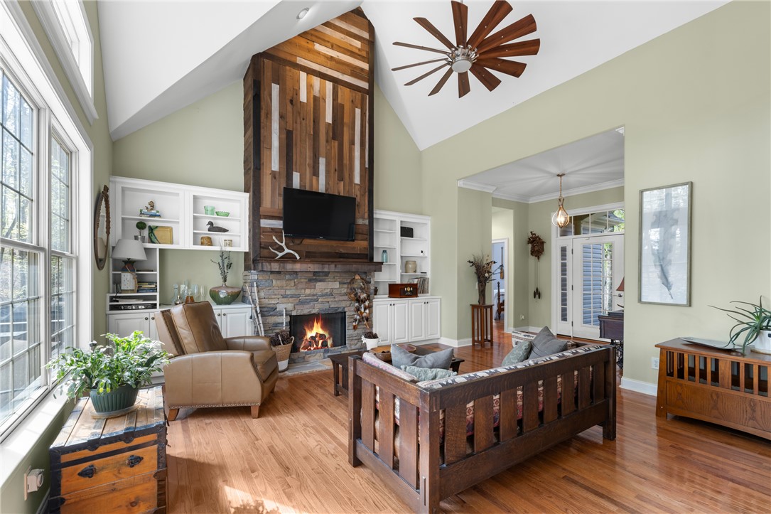 3 Halyard Way Salem, SC 29676 - Photo 6 of 48 This inviting living room showcases a striking fireplace and expansive windows.