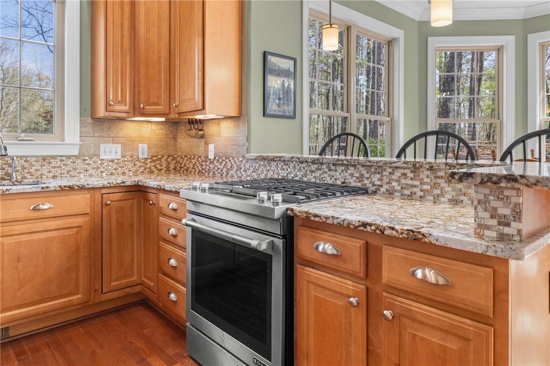 3 Halyard Way Salem, SC 29676 - Photo 10 of 48 This culinary space combines functionality with natural beauty, featuring gleaming surfaces and a spacious layout.