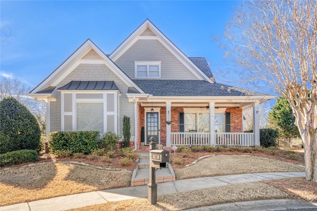 2380 Muskogee Lane Braselton, GA 30517 - Photo 2 of 30 a front view of a house with garden