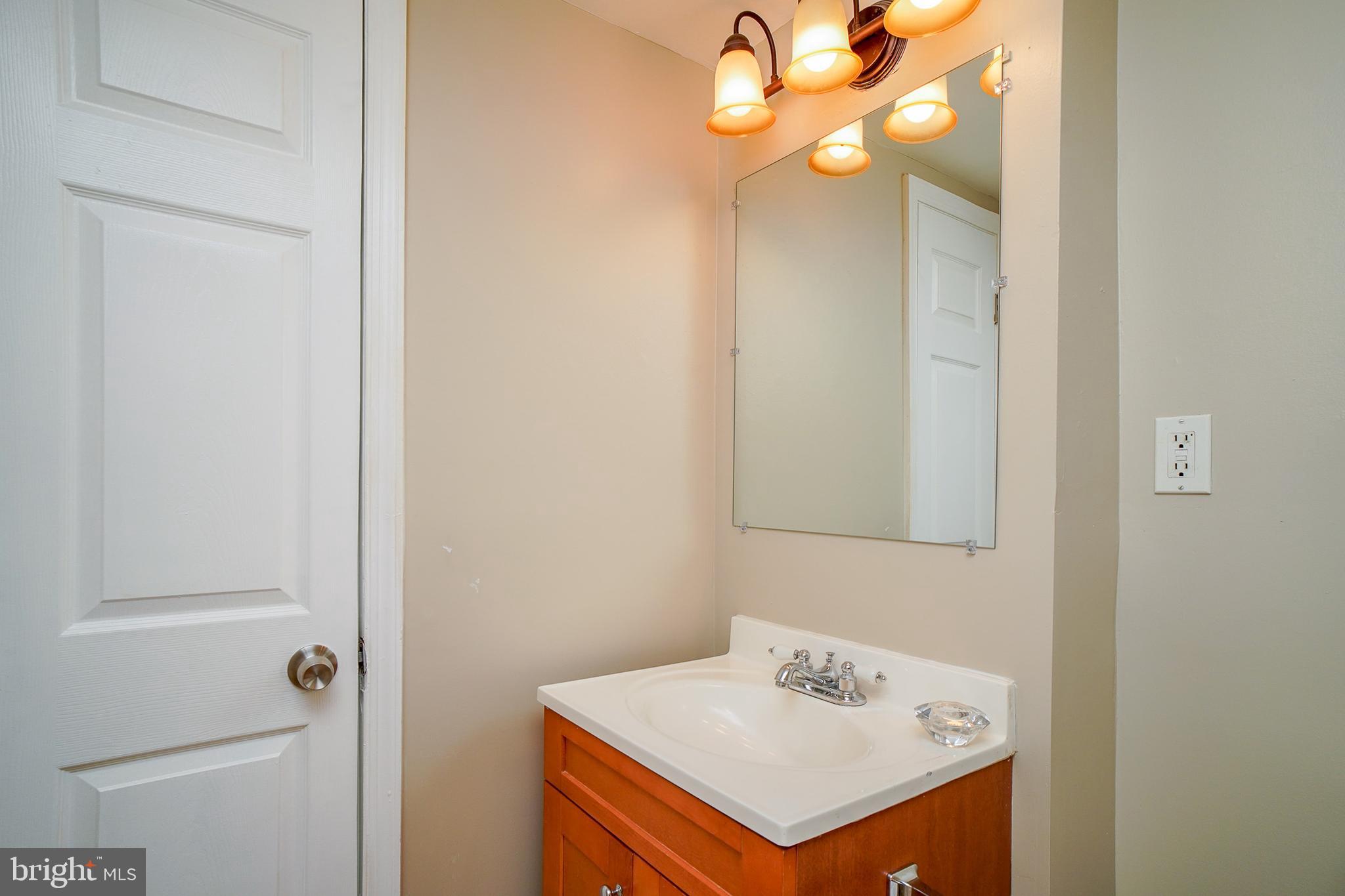 1835 Addison Road South District Heights, MD 20747 - Photo 18 of 26 Bathroom Vanity