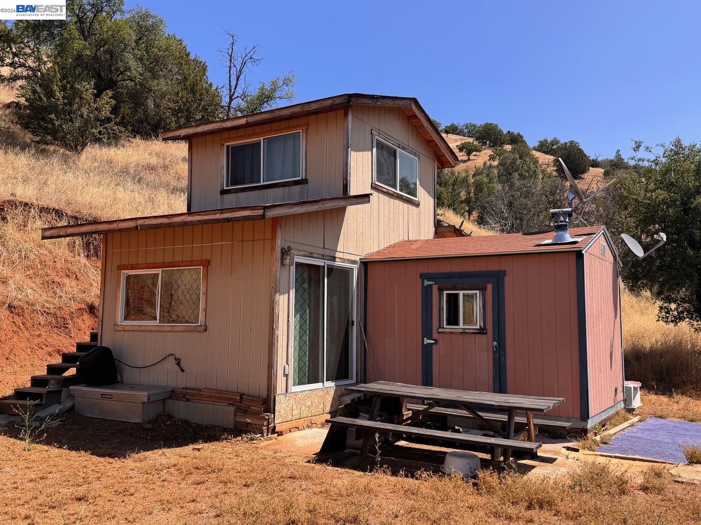 21810 Mines Road Livermore, CA 94550 - Photo 2 of 11 a front view of a house with a yard