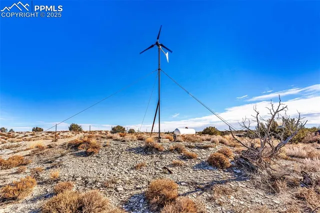 a backyard of a house with a mountain